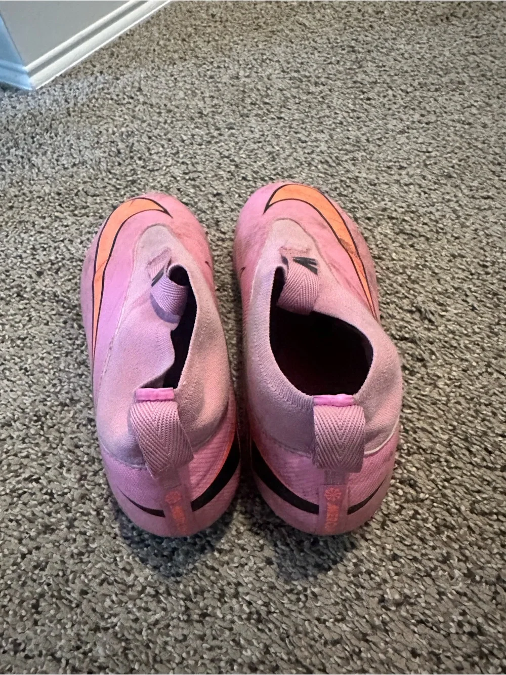 Nike Pink Laceless Soccer Shoes with Orange Swoosh
